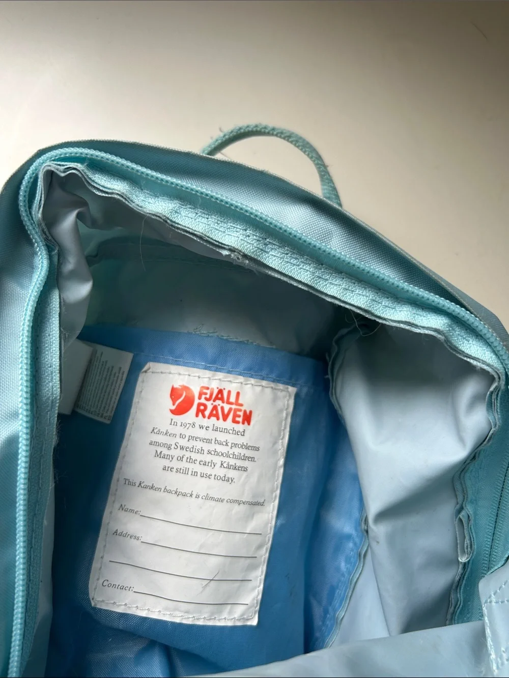 Fjallraven Kånken Mini Backpack in Light Blue with Red Logo